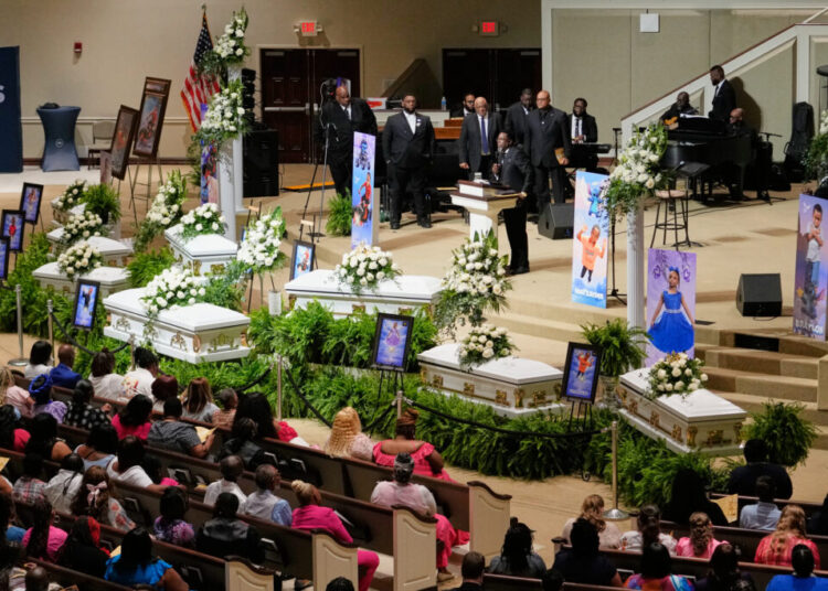 Eight children mourned at mass funeral that captured national attention