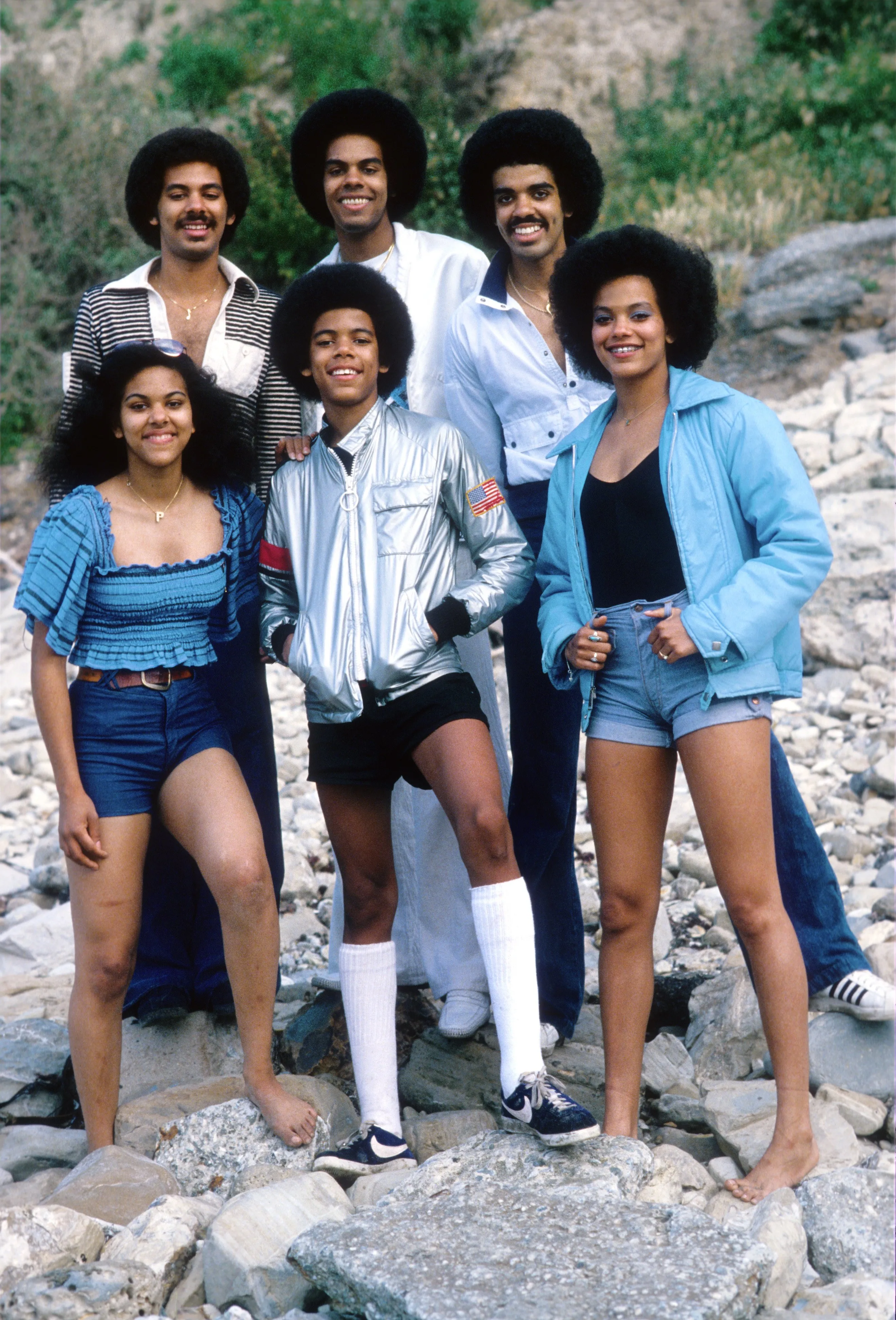 The Sylvers (L-R Pat,James Sylvers, Foster Sylvers, Edmund Sylvers, Ricky Sylvers and Angie Sylvers) pose for a portrait on the beach in May, 1978 in Los Angeles, California.