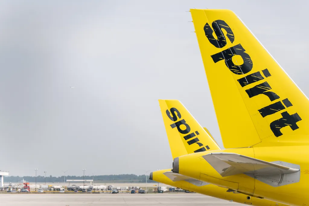 Two yellow airplane tails with 