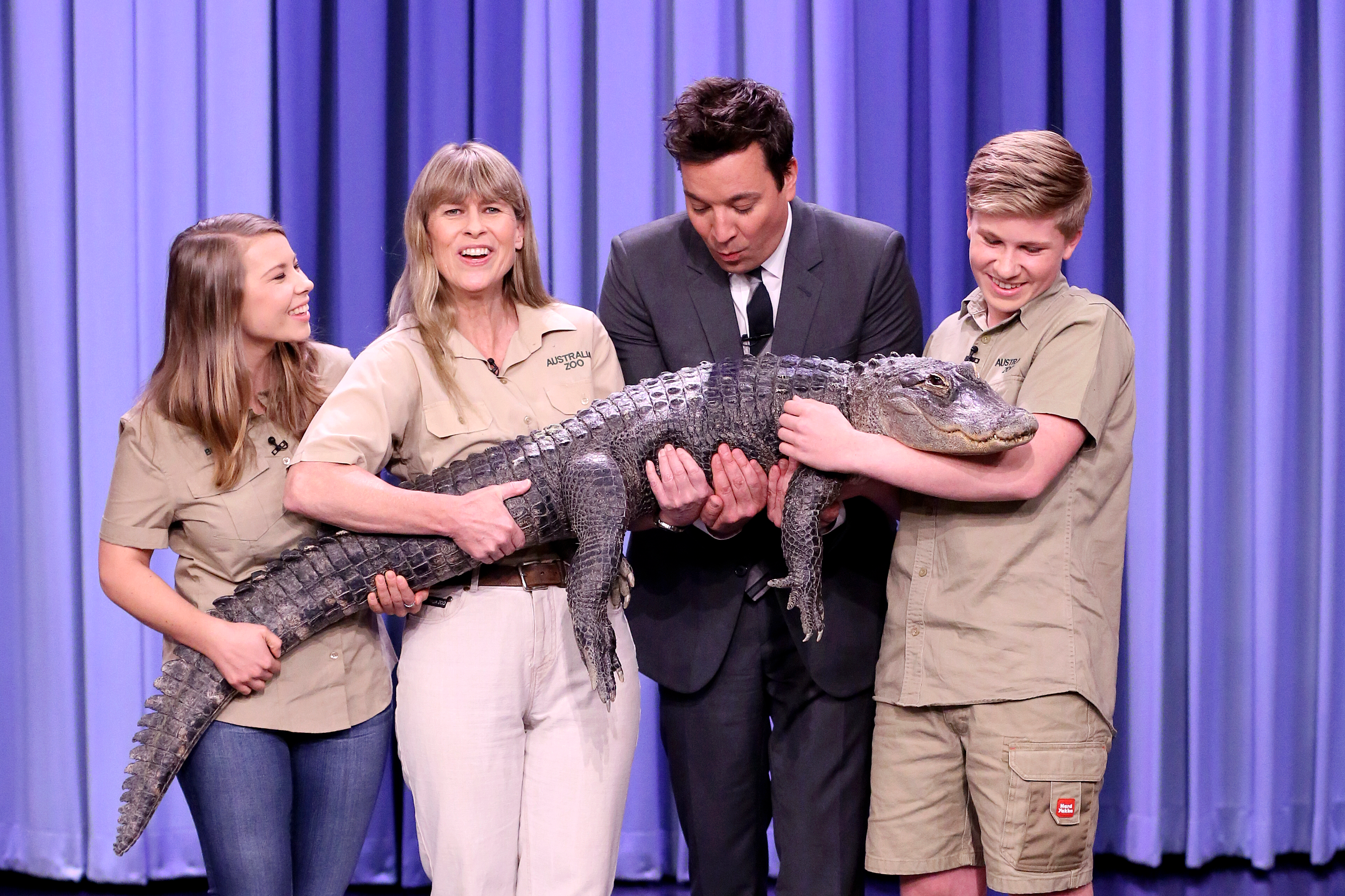The Irwin family (Bindi, Terri, and Robert) with Jimmy Fallon holding an alligator on 