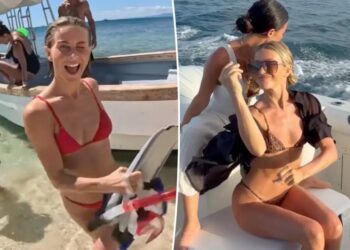Julianne Hough rocks leopard-print and snakeskin bikinis during tropical getaway in Fiji