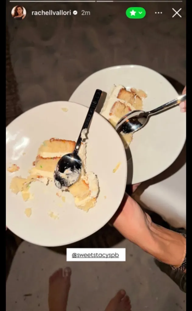 Two white plates with partially eaten slices of white cake, with forks in them.