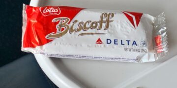 Delta is cutting snacks and drinks on short flights. Our reporters debate.