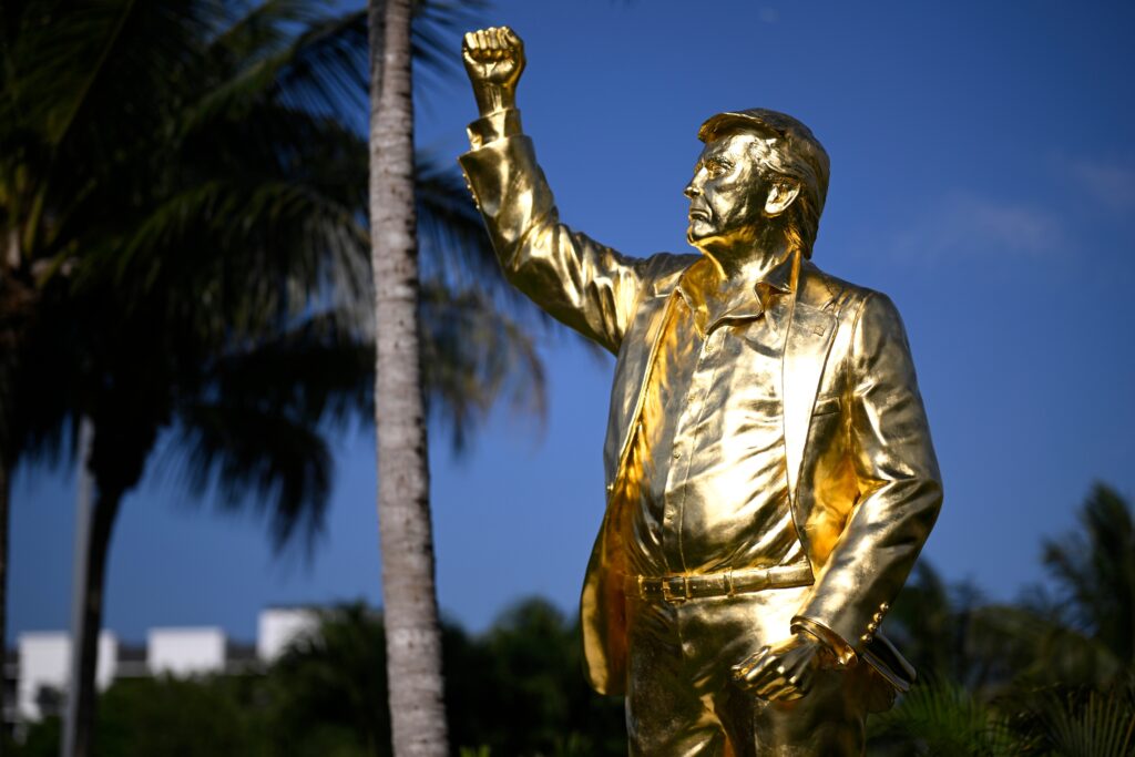 A golden statue of Trump draws mixed reactions at his golf course