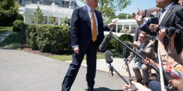 Trump arrives in China with lowered ambitions, hoping for deals