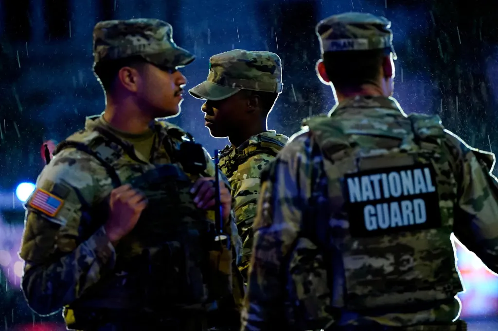 Members of the National Guard gather near the White House after a shooting incident in Washington, D.C., U.S., May 23, 2026. 