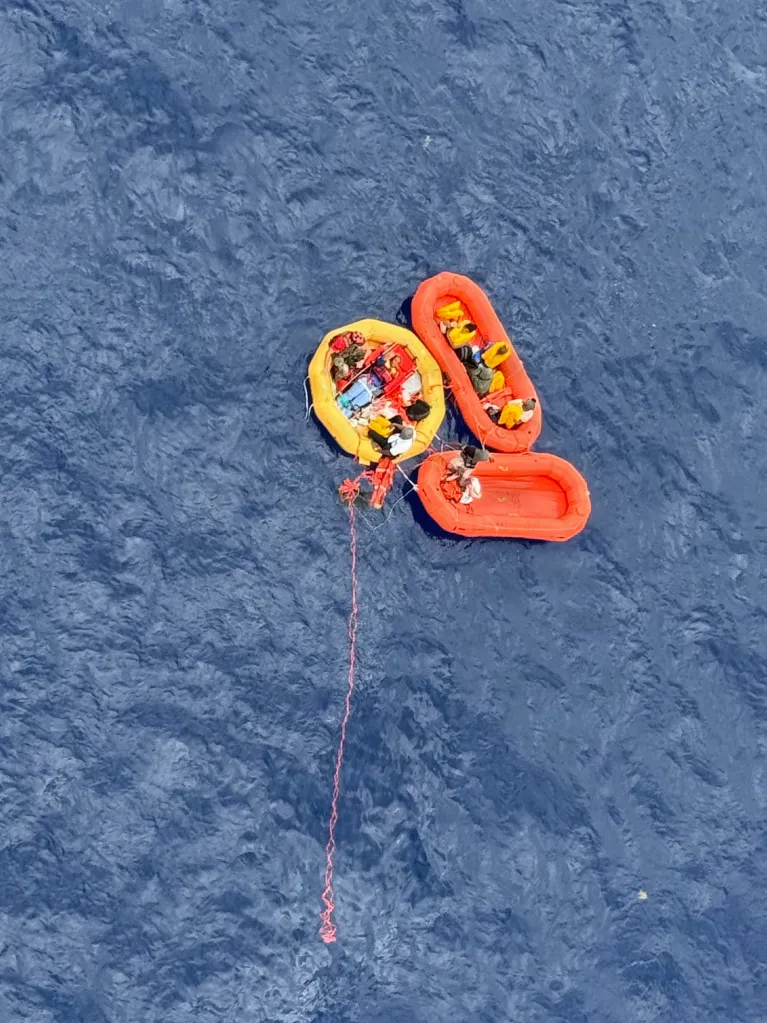 Rescue rafts carrying plane crash survivors in the Atlantic Ocean.