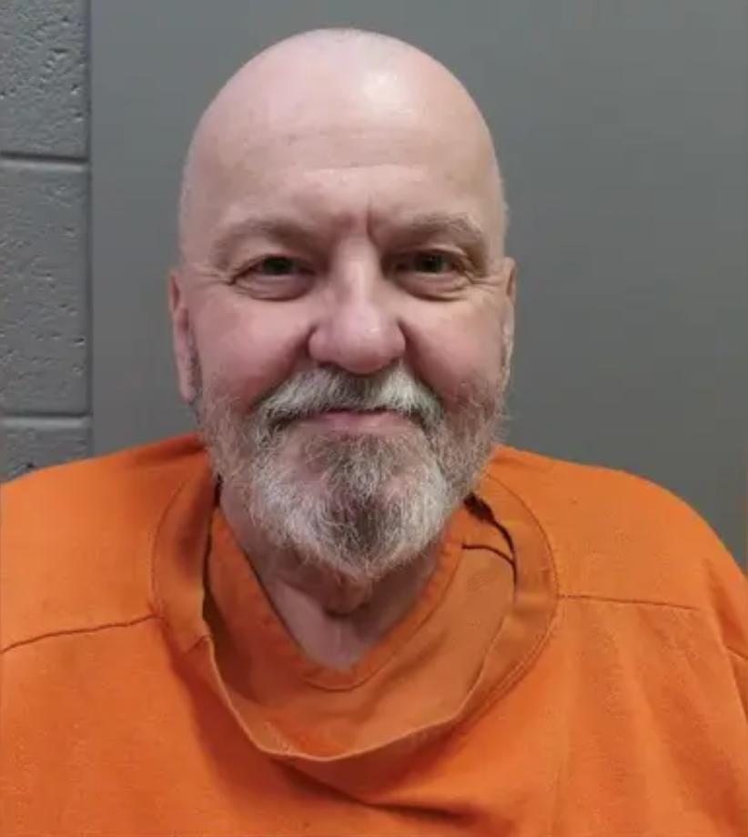 Jerry Wayne Ross flashes a grin after his arrest for alleged hit-and-run on April 23, 2026.