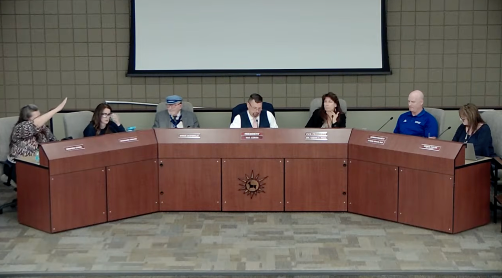 Kim Fisher gives a Nazi salute during a Deer Valley Unified School District Governing Board meeting on May 26, 2026.
