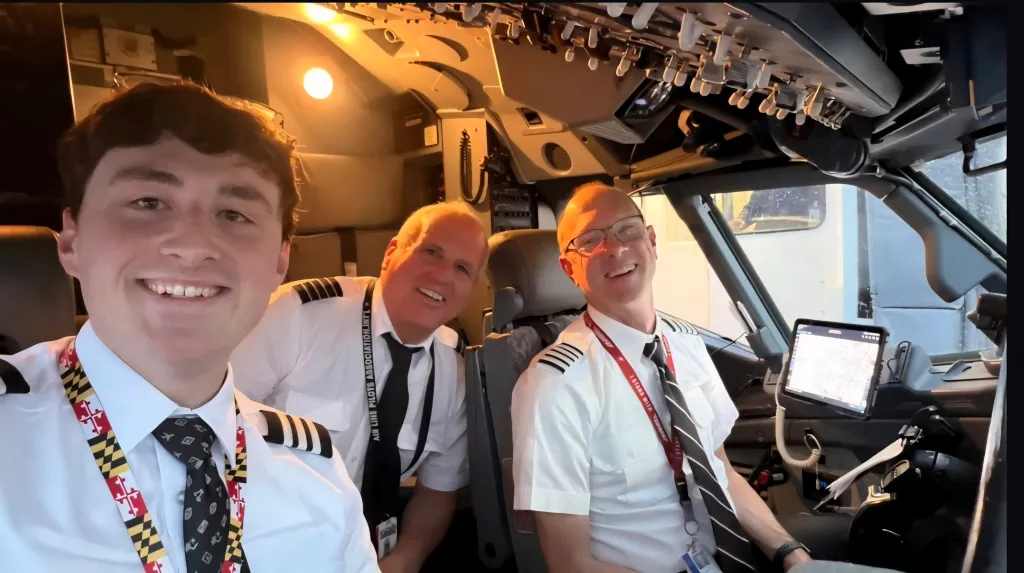 Capt. Jon Jackson sits behind his son, Southwest First Officer Chris Jackson and another Southwest pilot during a trip from Florida to Baltimore on May 2, 2026.