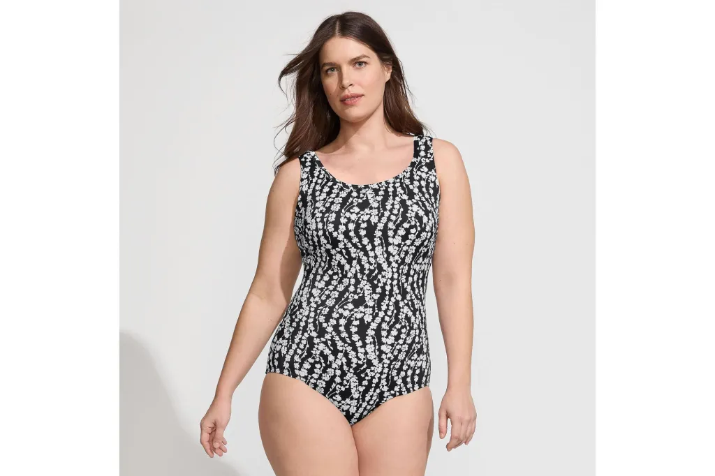 A woman in a one-piece with a diamond print.