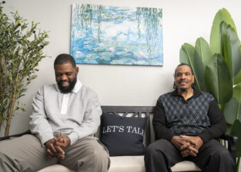 These grandparents sit on benches, ready to talk to strangers who need them