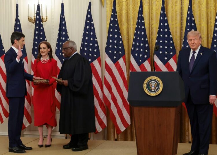 Fed chief sworn in at the White House, facing surging inflation