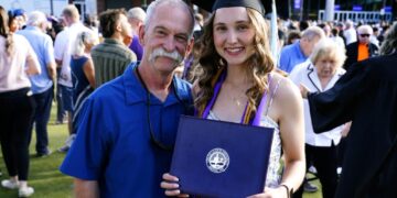Firefighter travels 600 miles to college graduation of baby he helped deliver years ago