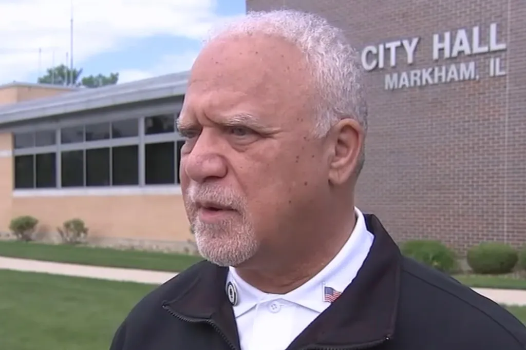 Man standing in front of City Hall Markham, IL.