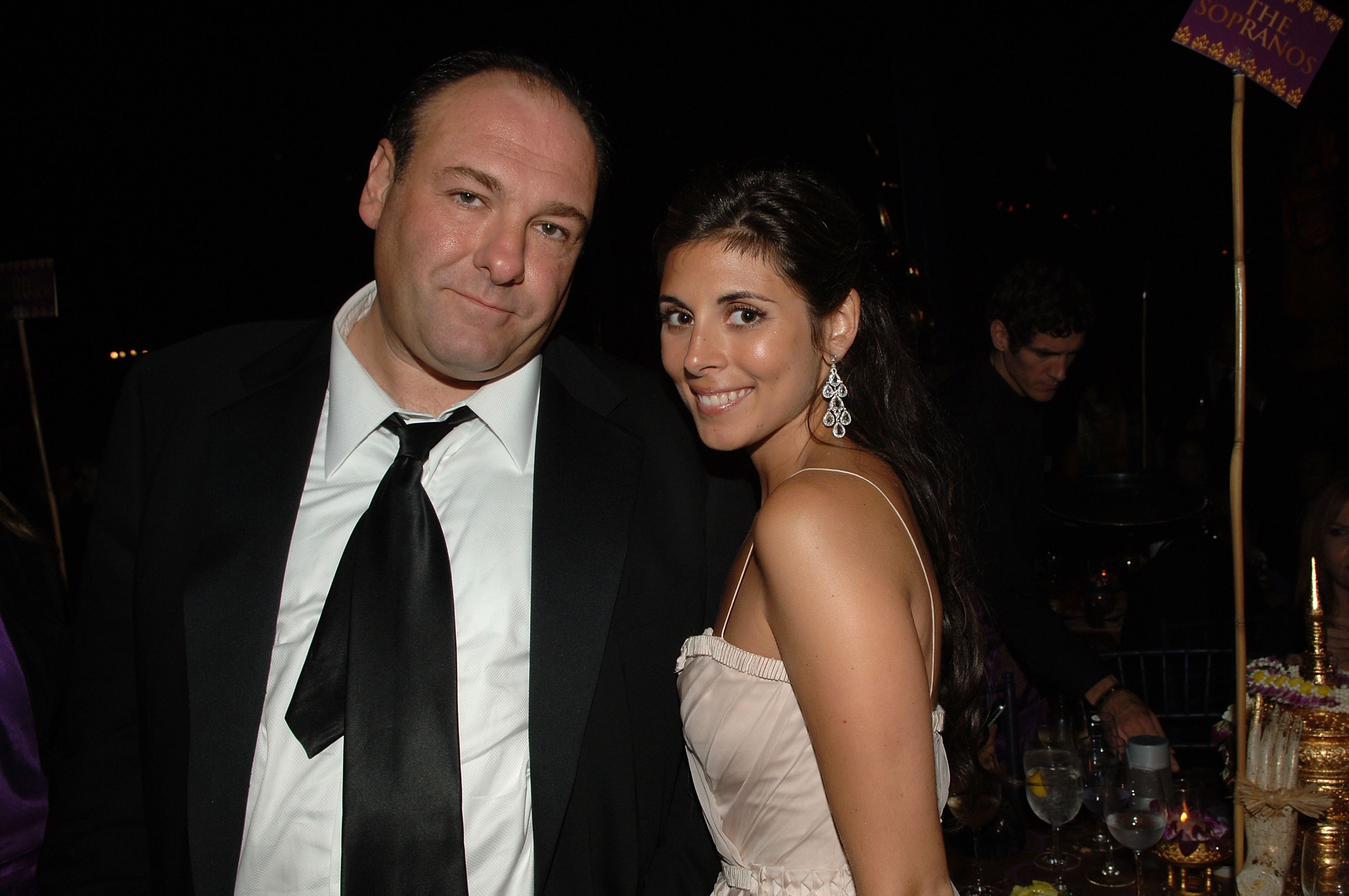 Actors James Gandolfini and Jamie-Lynn Sigler smiling at the HBO Emmy after party.