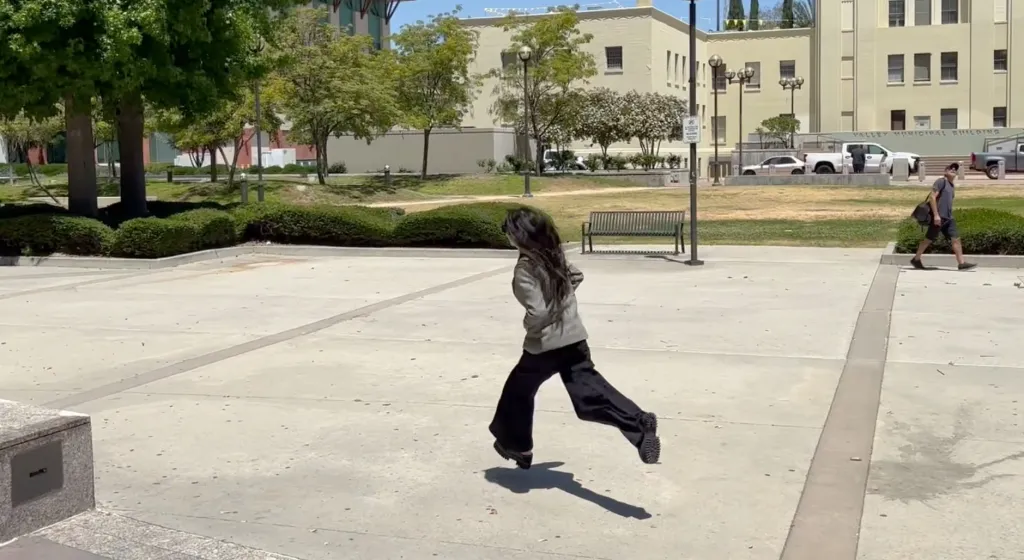 Adva Lavie sprinting out of court in Los Angeles.