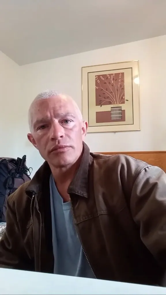 Matt Brown looking at the camera in a video still.