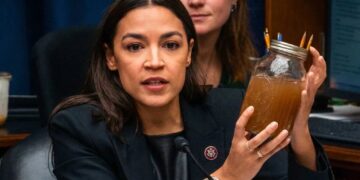 AOC brandishes jars of filthy water as she shames Trump official