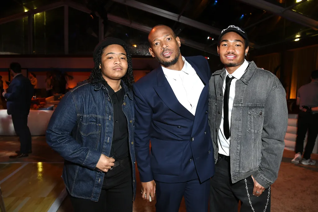 Marlon Wayans poses with his sons, Amai Zackary Wayans and Shawn Wayans, at the