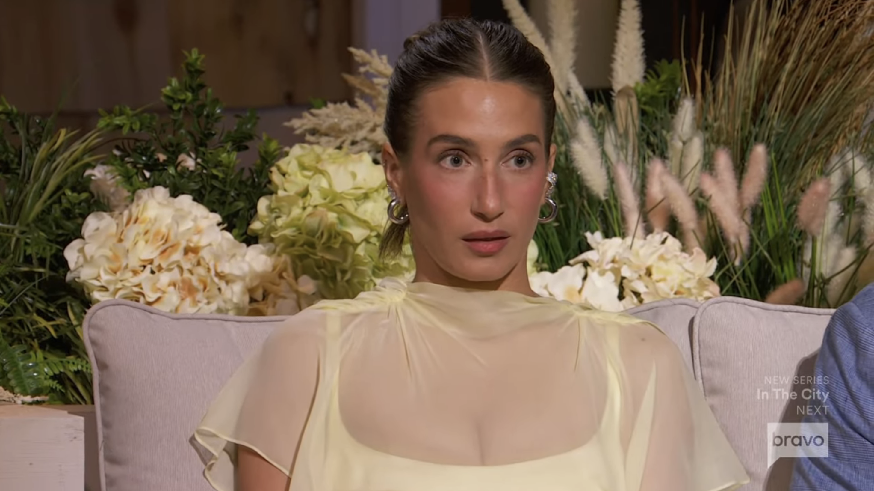 Amanda Batula looking surprised during a Summer House reunion.