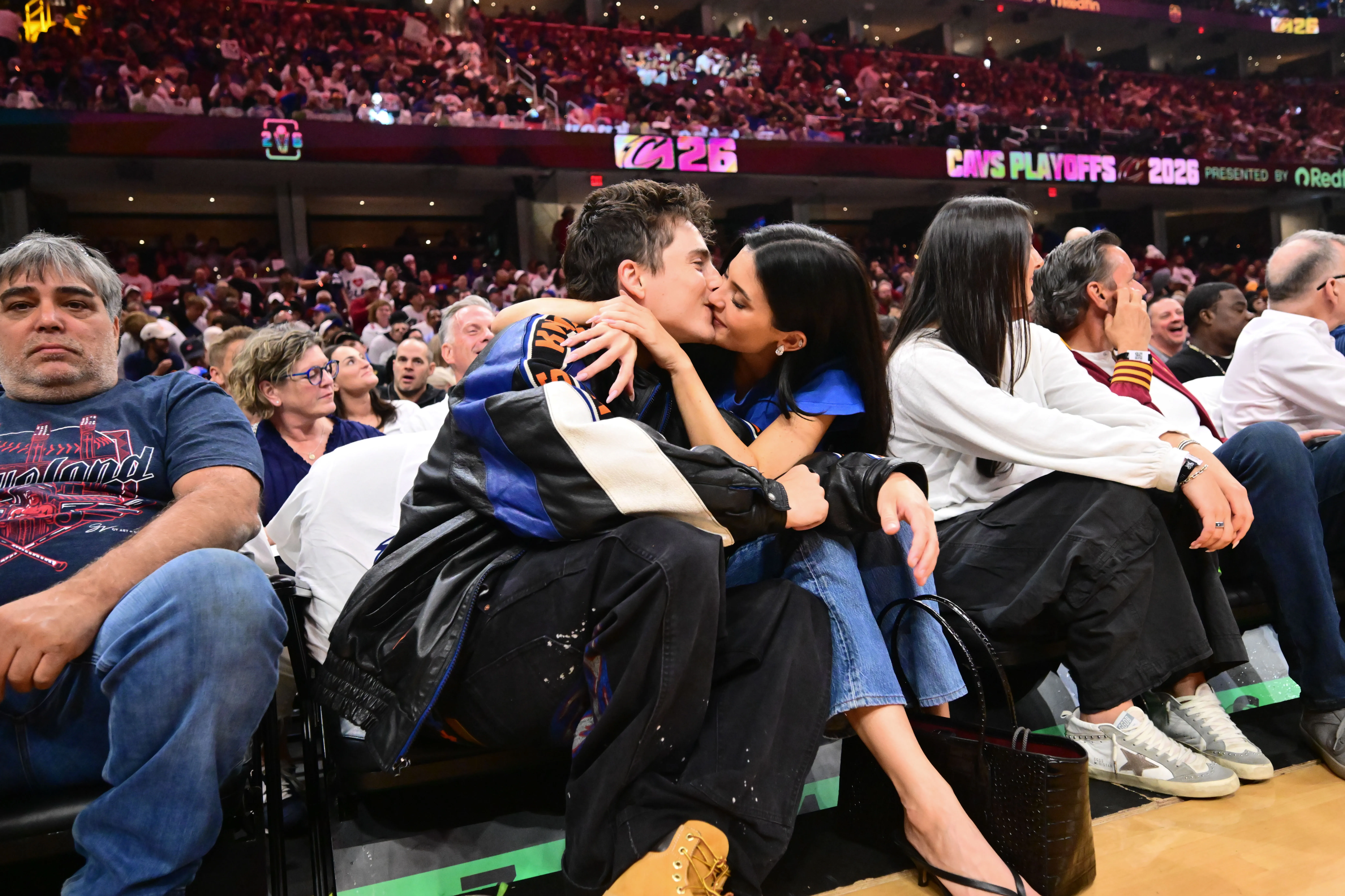 Timotheé Chalamet and Kylie Jenner kissing during game four of the Eastern Conference Finals for the 2026 NBA playoffs.