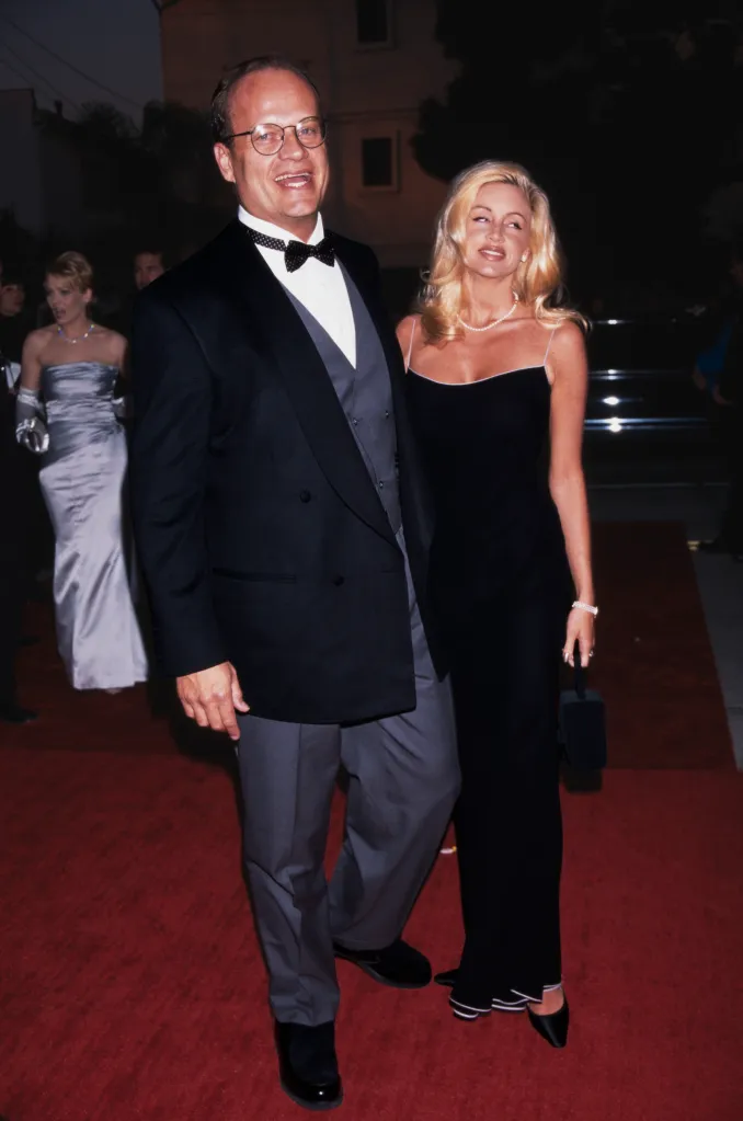American actors Kelsey Grammer and Camille Donatacci on a red carpet.