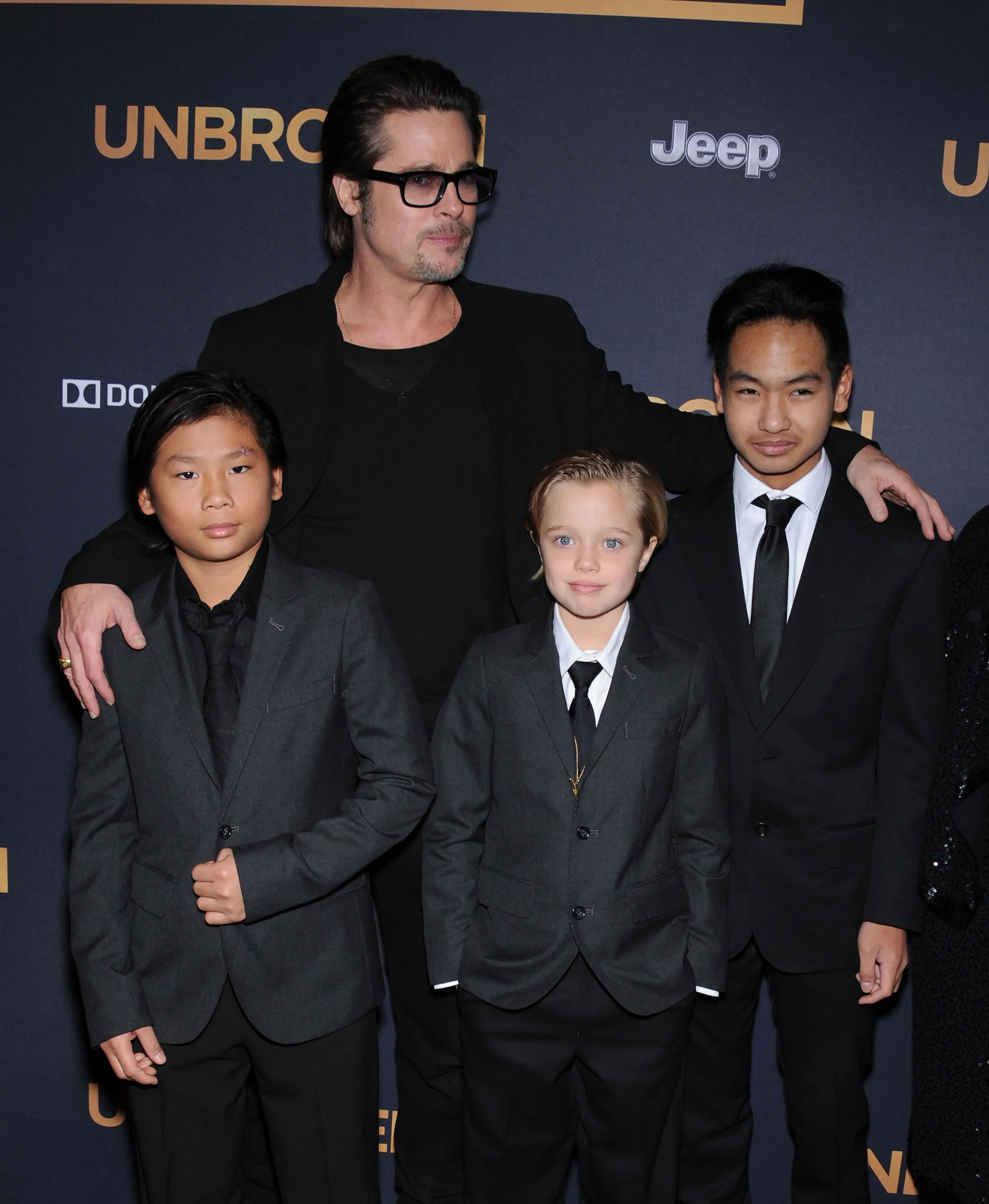 Brad Pitt with Maddox, Shiloh, and Pax Jolie-Pitt.