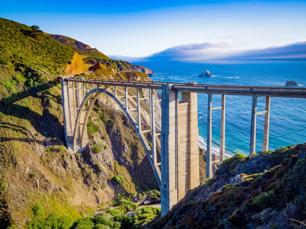 Bixby Creek Bridge on Highway 1, arching over a canyon towards the Pacific Ocean at Big Sur, California.