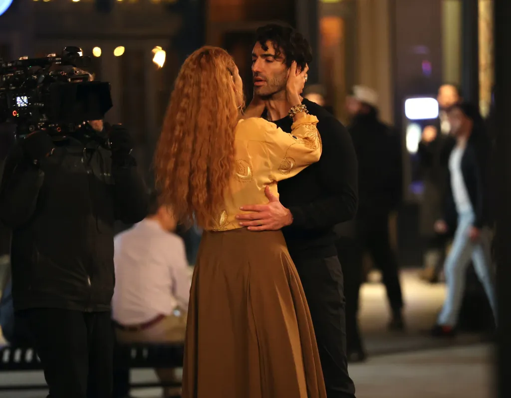 Blake Lively and Justin Baldoni embrace on the set of 