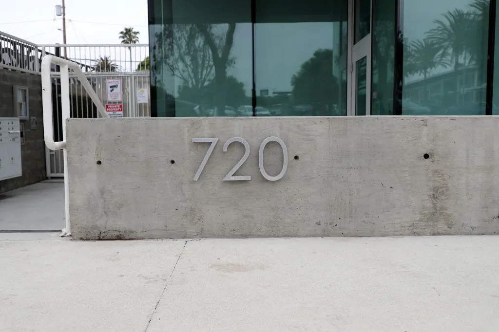 A concrete wall with the number 