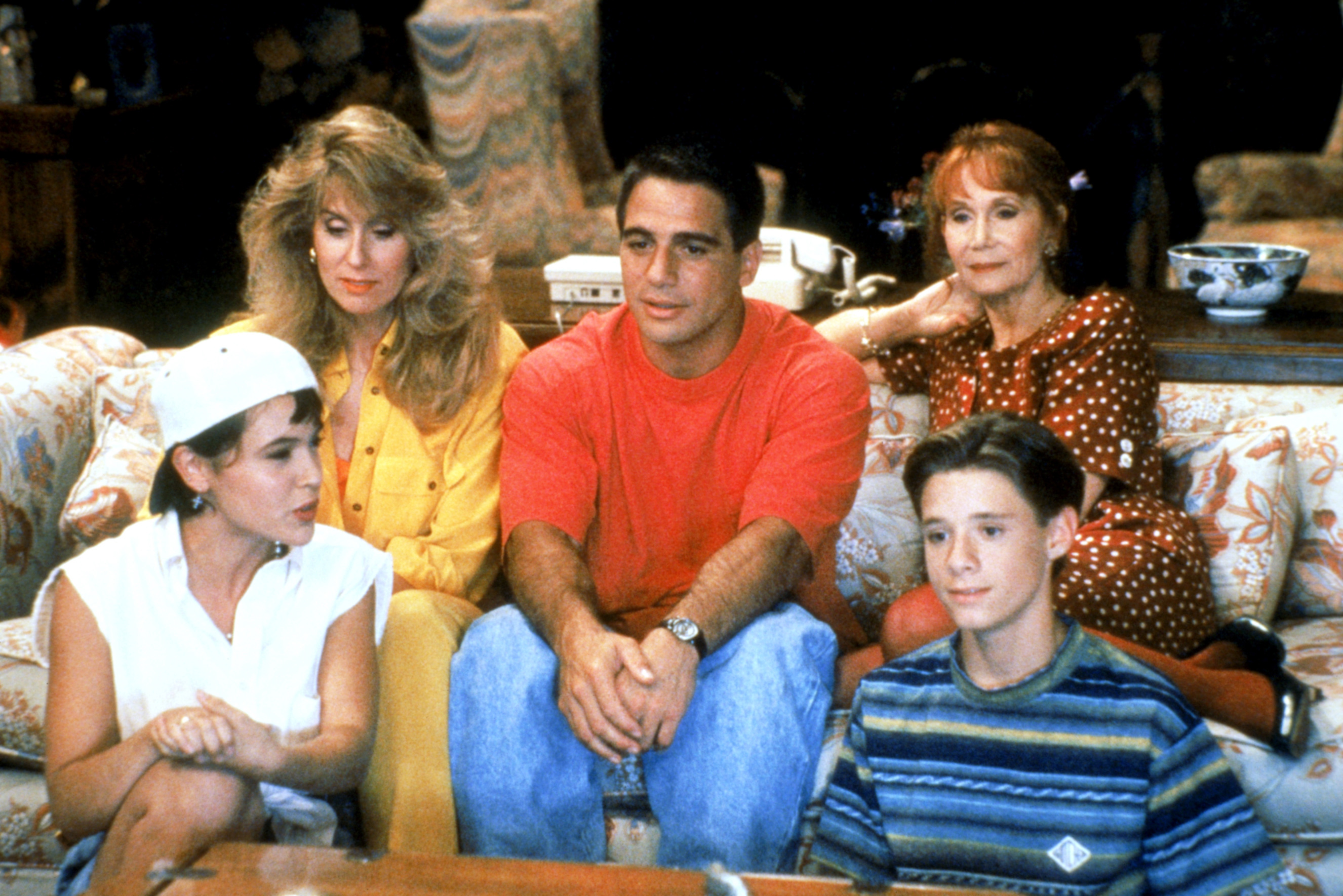 Cast photo of the Who's the Boss? TV show featuring Alyssa Milano, Judith Light, Tony Danza, Katherine Helmond, and Danny Pintauro.