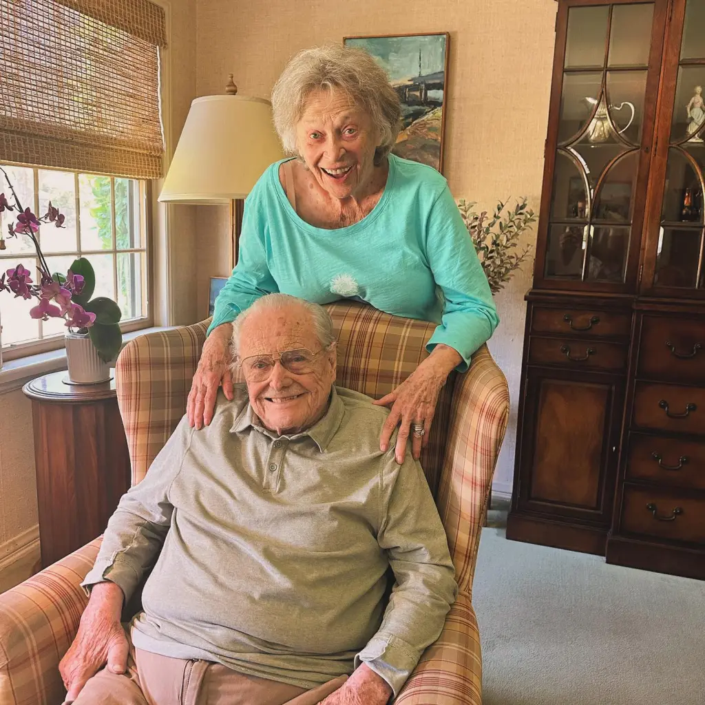 Actors William Daniels and Bonnie Bartlett smiling together.