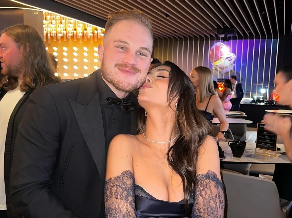 Brianna Chickenfry and Zach Bryan posing for an Instagram photo.