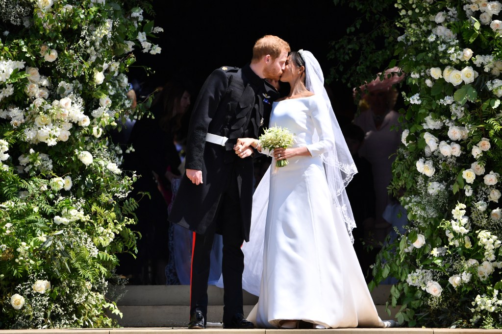 Prince Harry kissing Meghan Markle after their wedding.