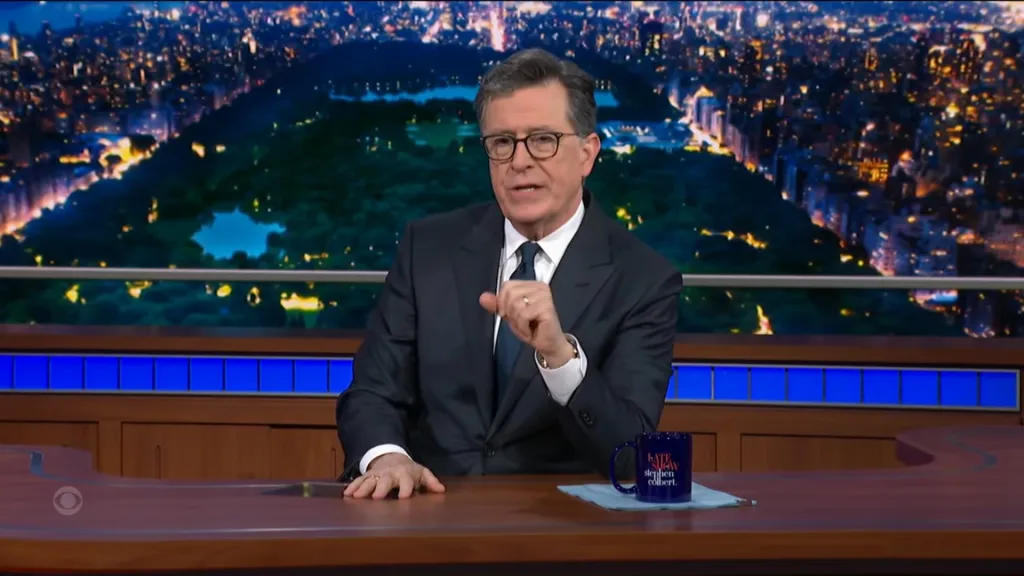 Stephen Colbert at his desk during 