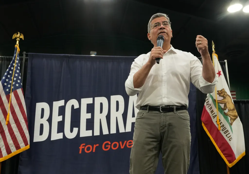 Xavier Becerra speaking at a town hall meeting in Sacramento, California.