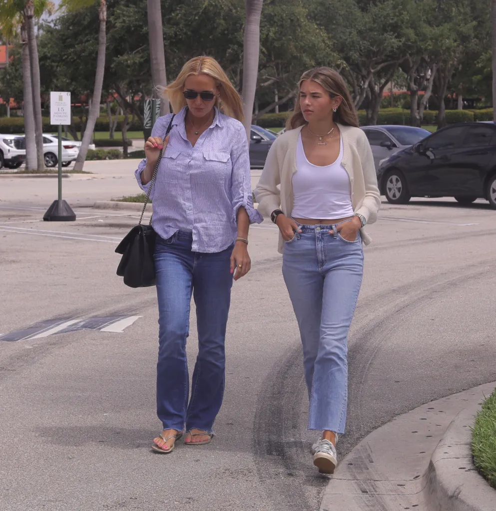Vanessa Trump and her daughter Kai Trump walk together outdoors.