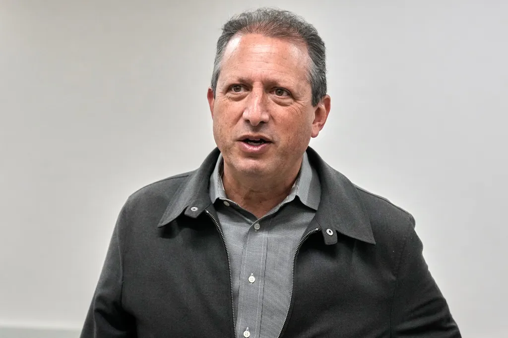 Brad Lander speaking with his mouth slightly open.