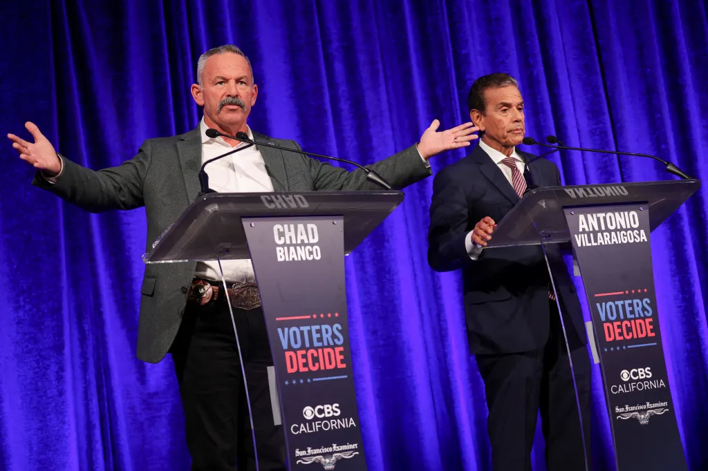 Chad Bianco and Antonio Villaraigosa at a debate for governor of California.