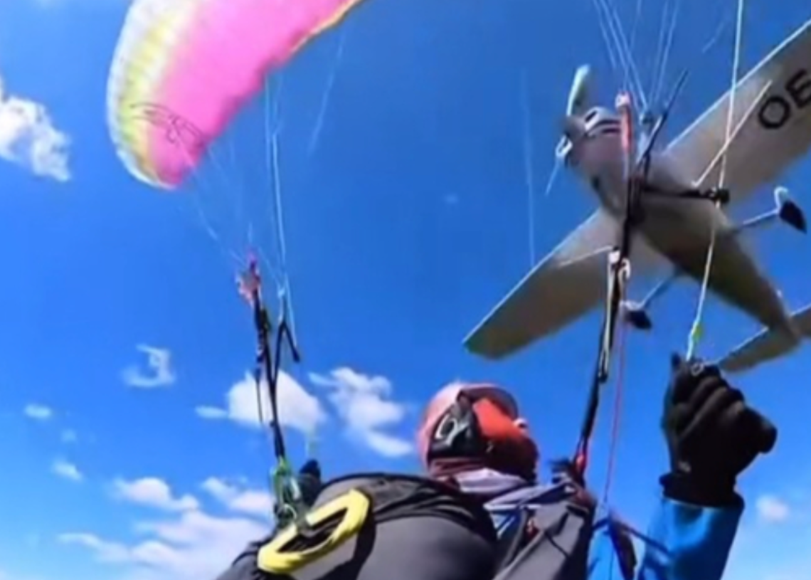 ‘Can’t Believe That I’m Sitting Here’: Paraglider Nearly Falls to Her Death After Plane Hits Her in Wild Video