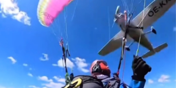 ‘Can’t Believe That I’m Sitting Here’: Paraglider Nearly Falls to Her Death After Plane Hits Her in Wild Video