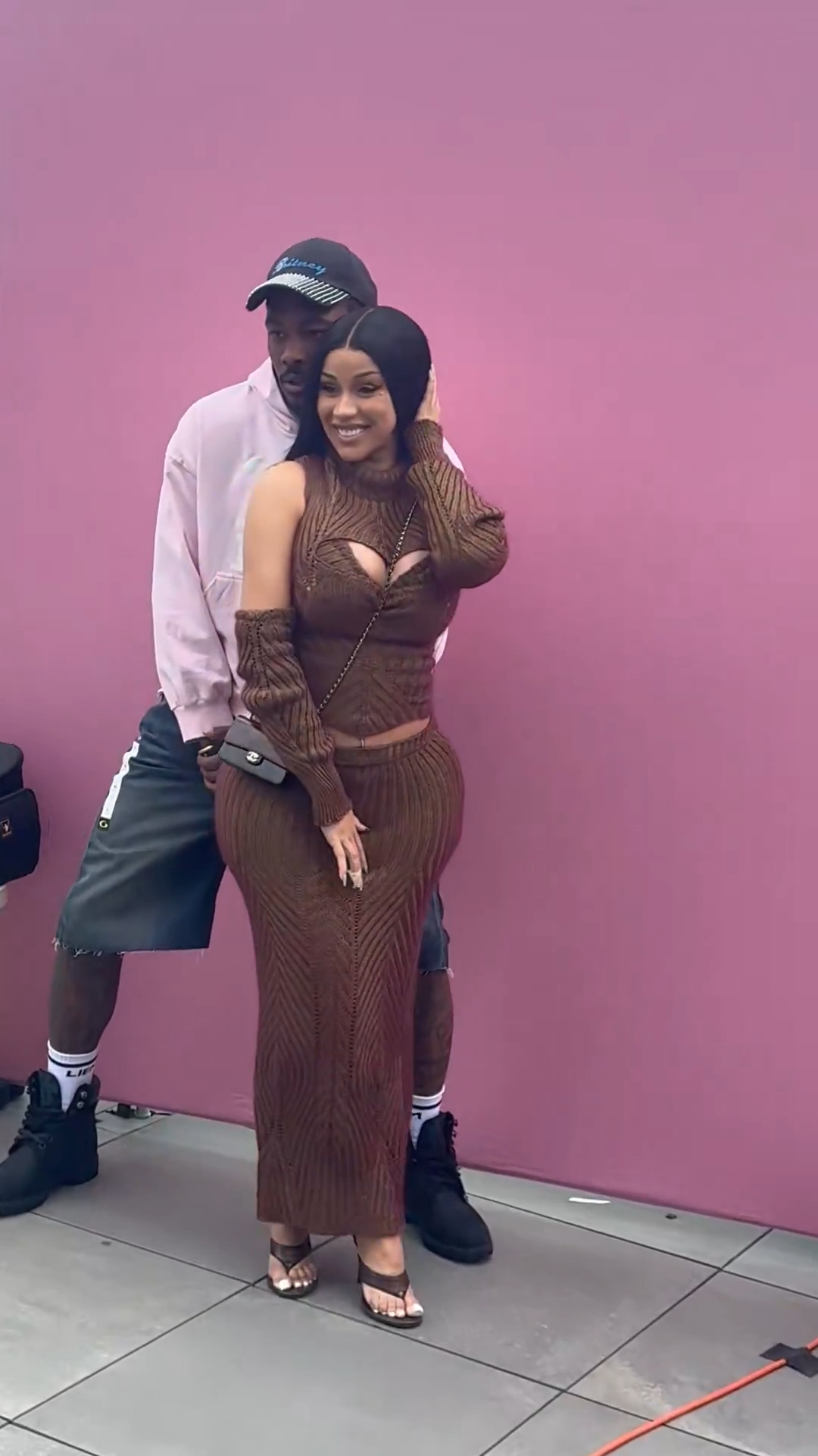 Cardi B and Stefon Diggs posing for a photo.