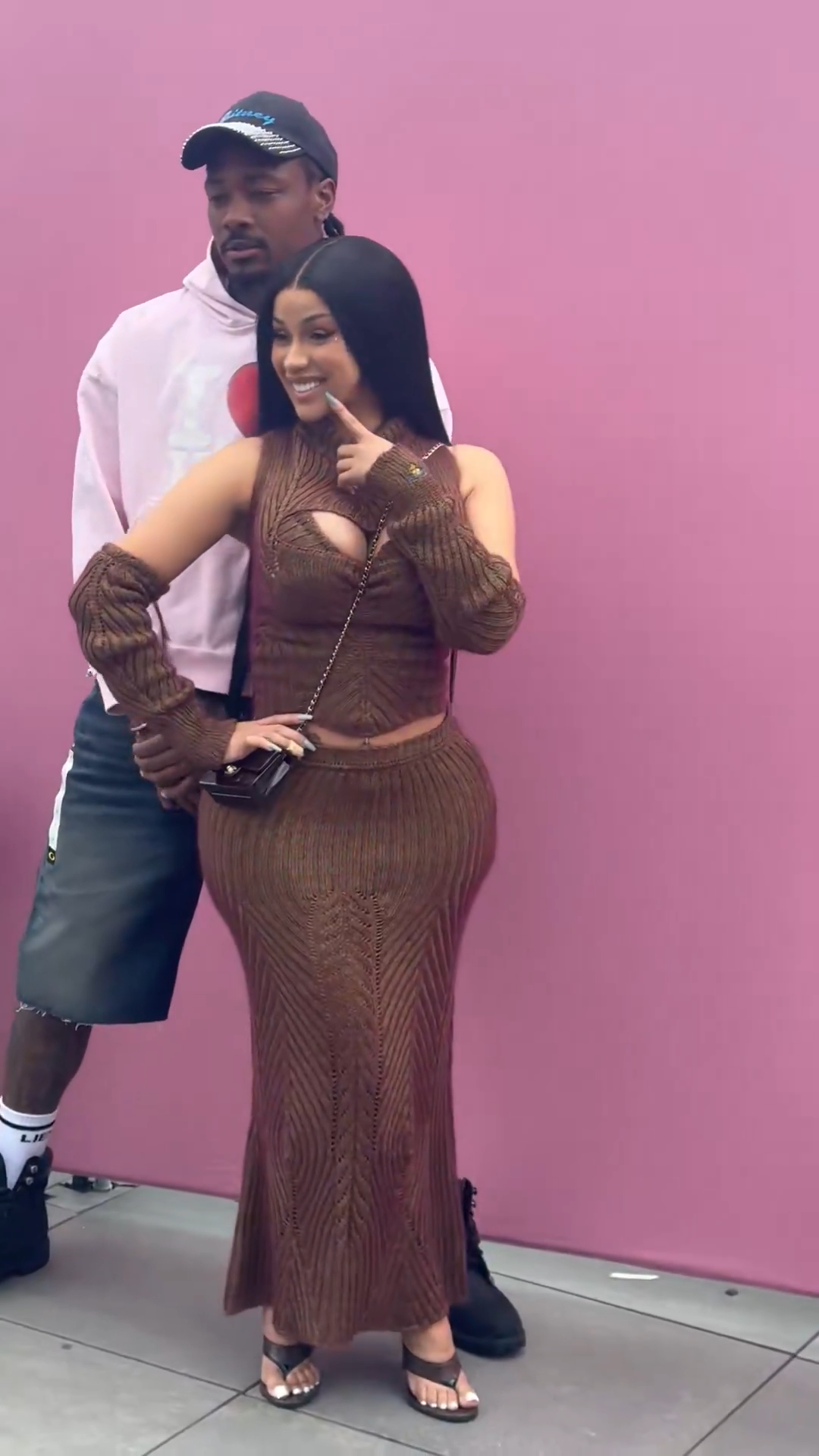 Cardi B and Stefon Diggs posing for a photo.