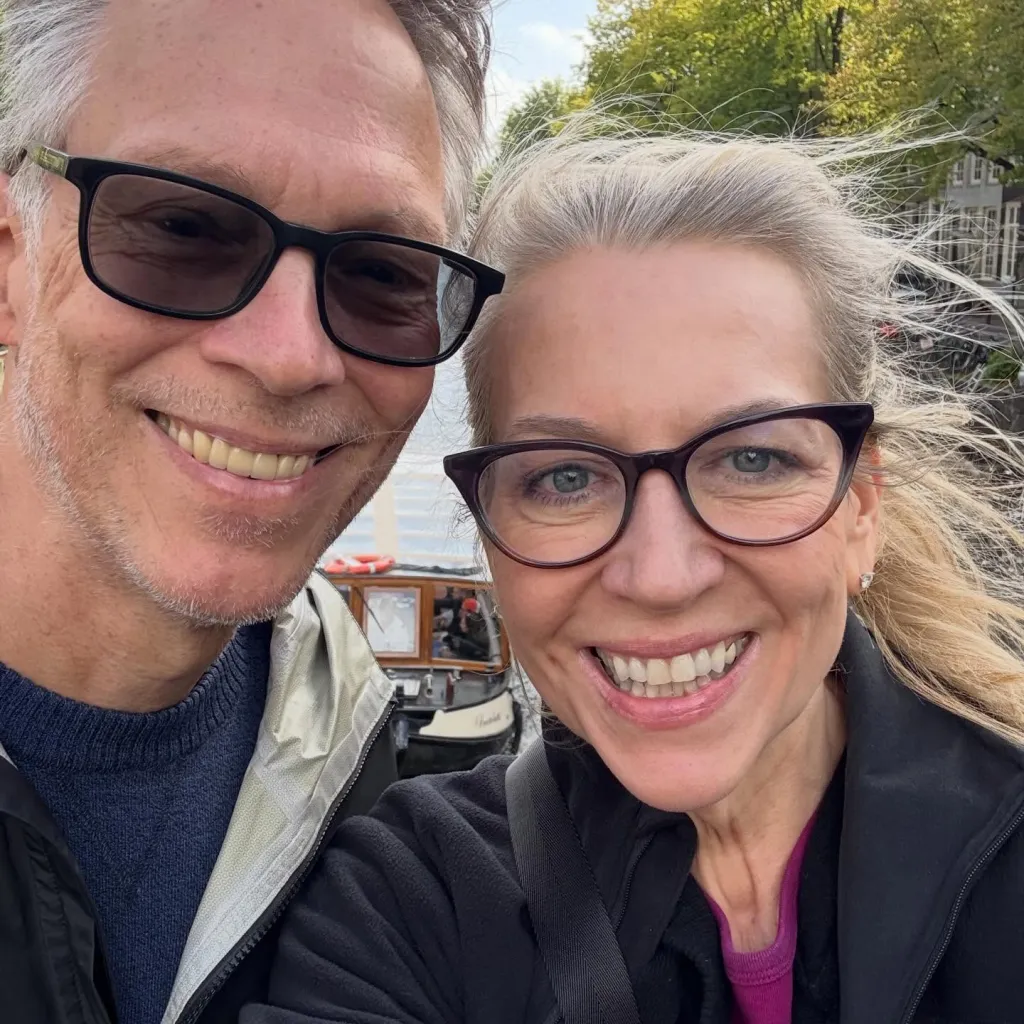 Cheryl Strayed and her husband Brian Lindstrom smiling for a selfie.