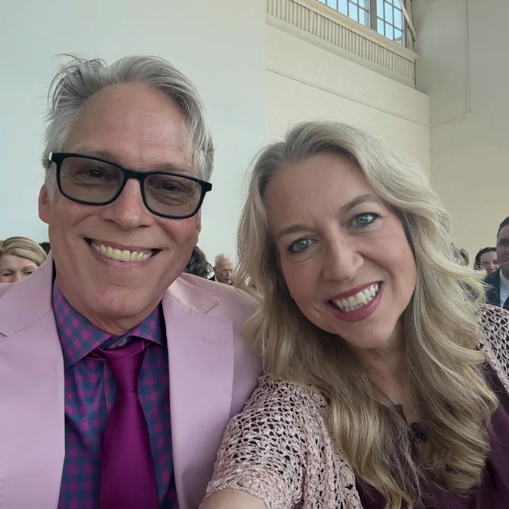 Cheryl Strayed and her husband, Brian Lindstrom, smiling.