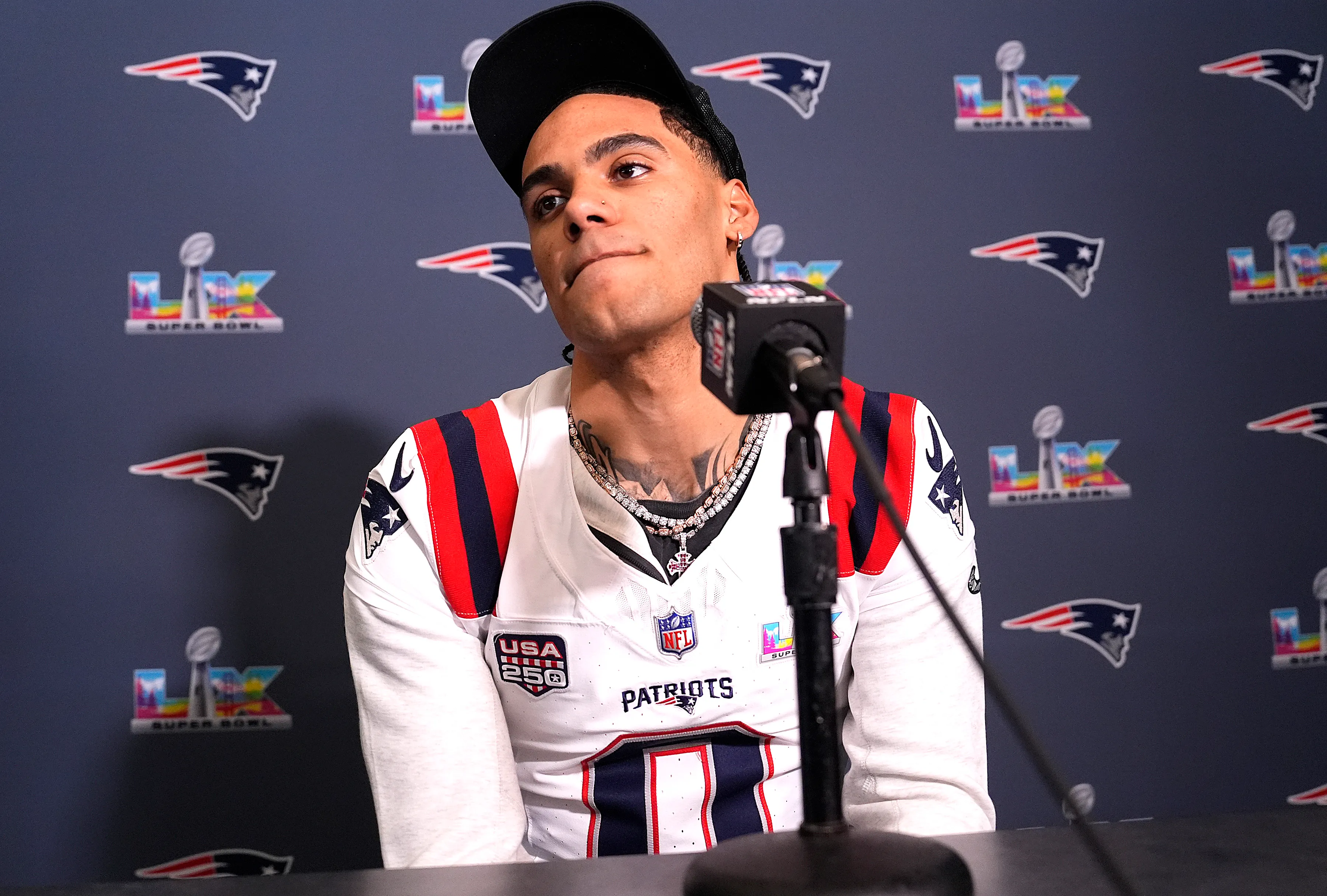 Christian Gonzalez of the New England Patriots speaking to media at Super Bowl LX.