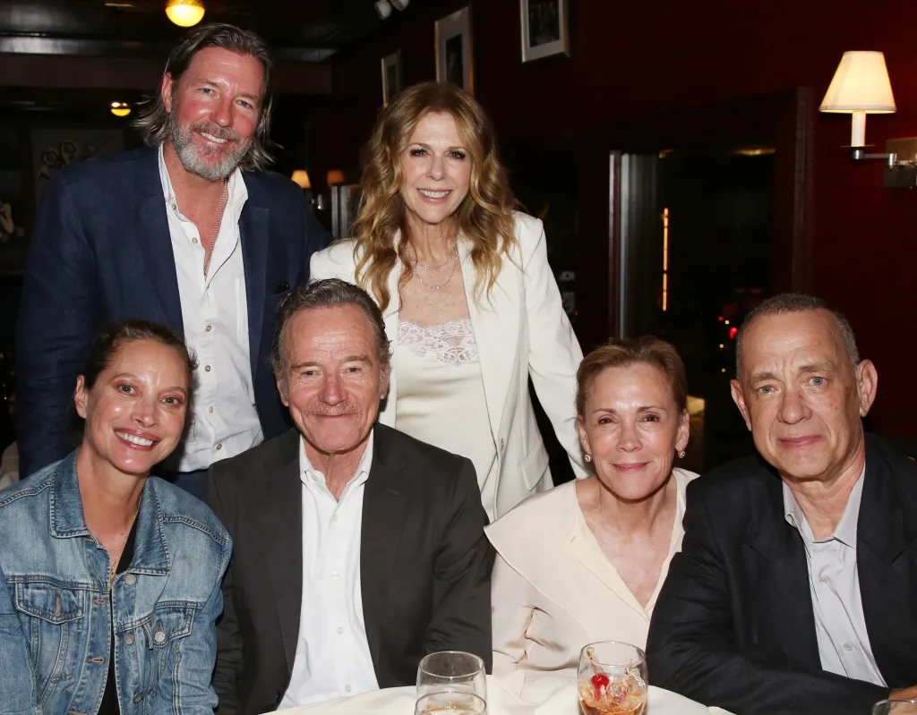 Christy Turlington, Ed Burns, Bryan Cranston, Rita Wilson, Robin Dearden, and Tom Hanks posing at the opening night after-party for