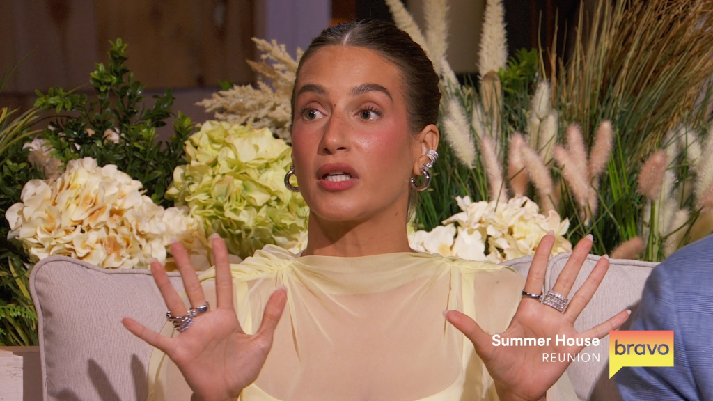 Ciara Miller speaking with her hands gesturing during the Summer House reunion.