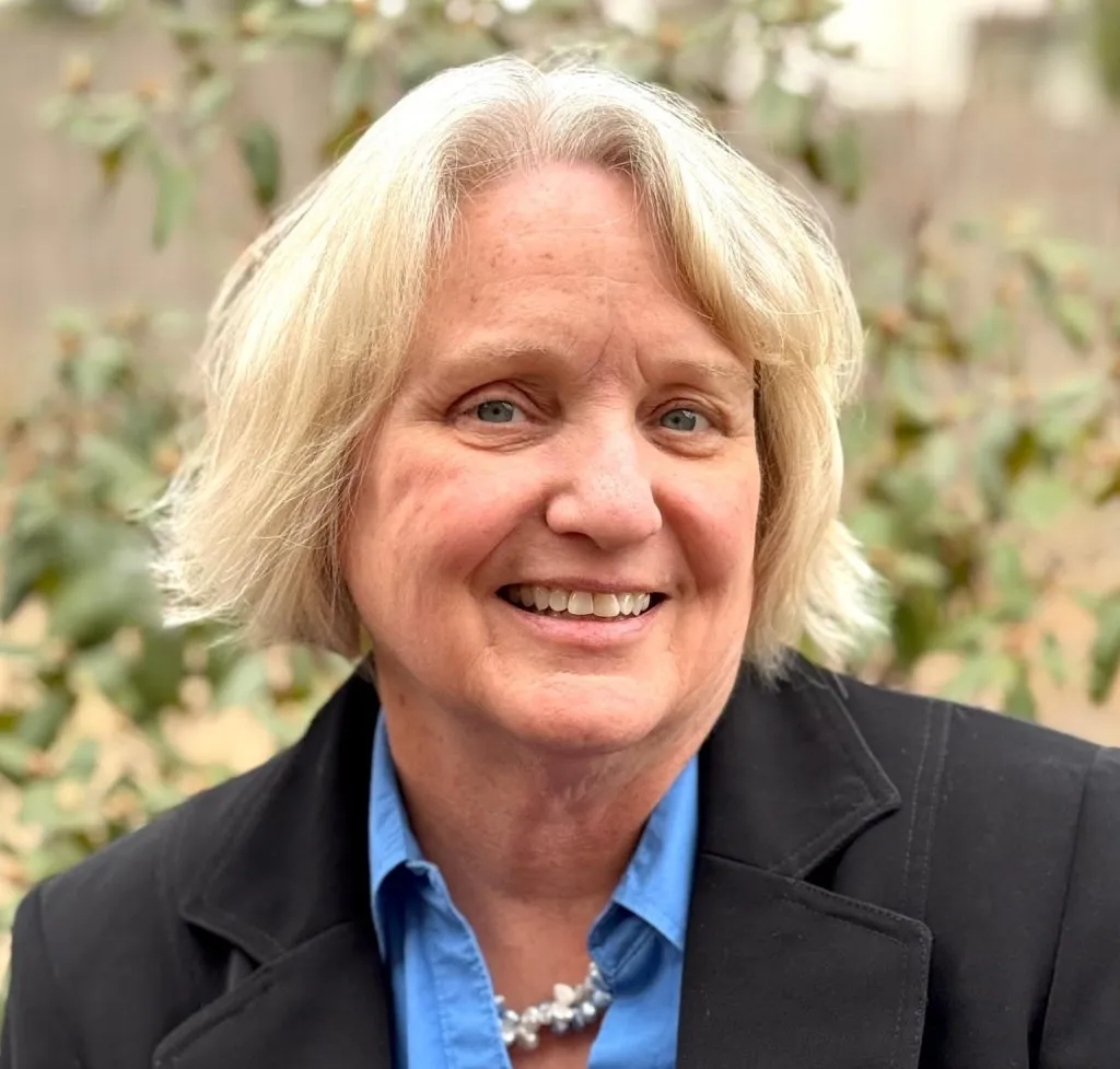 Cindy Burbank, who is running for Nebraska Senate, smiling.